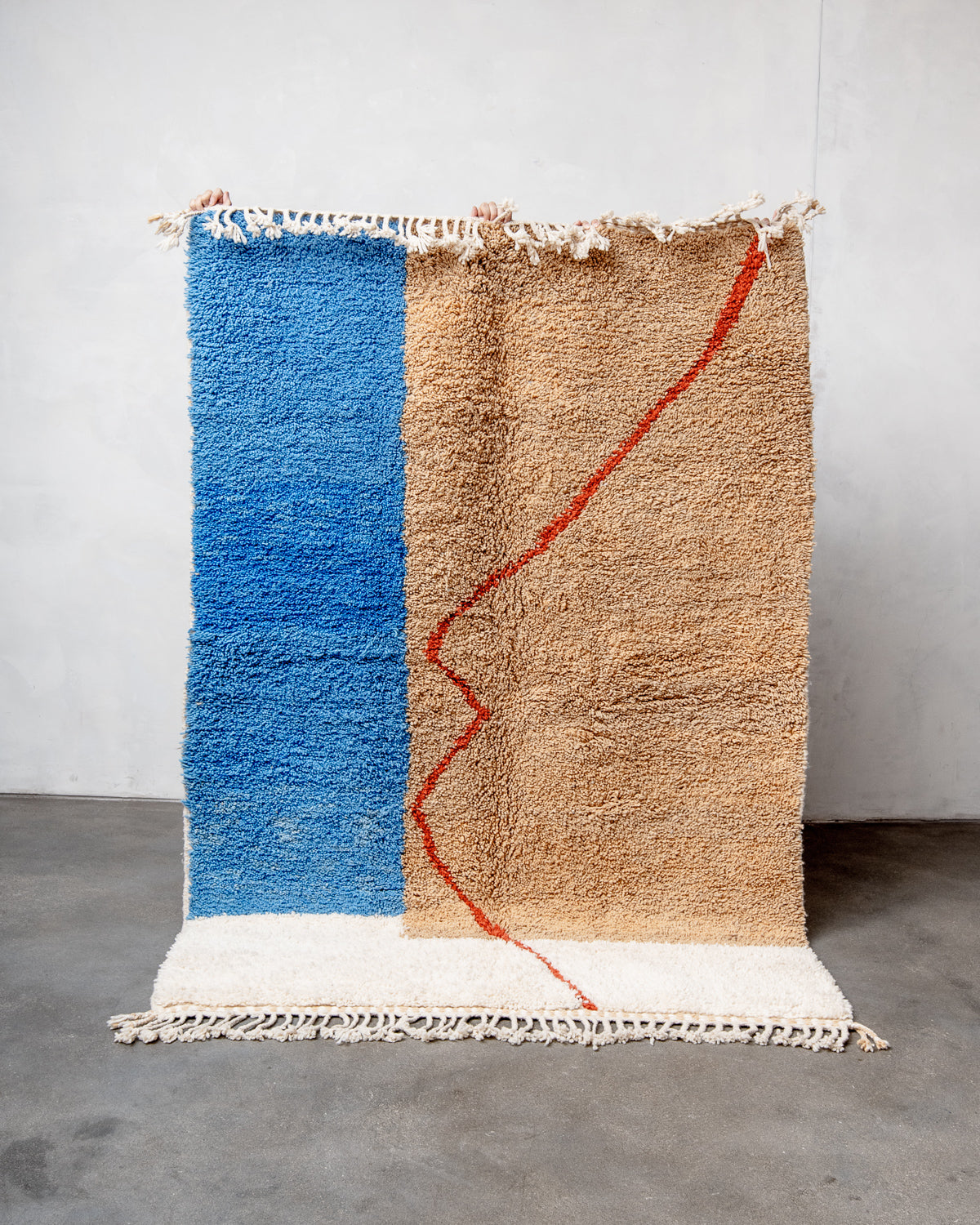 Modern, designer, handcrafted Berber rug from Morocco. Beniourain carpet with beautiful colours and patterns and fluffy wool texture.